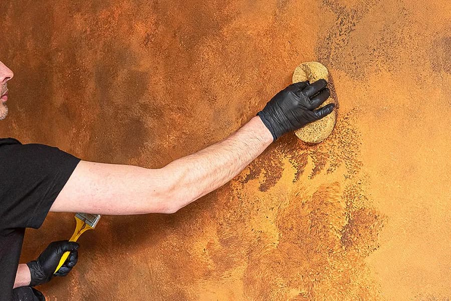 Wzory na elewacji domu - poznaj skuteczne techniki malowania dekoracyjnego