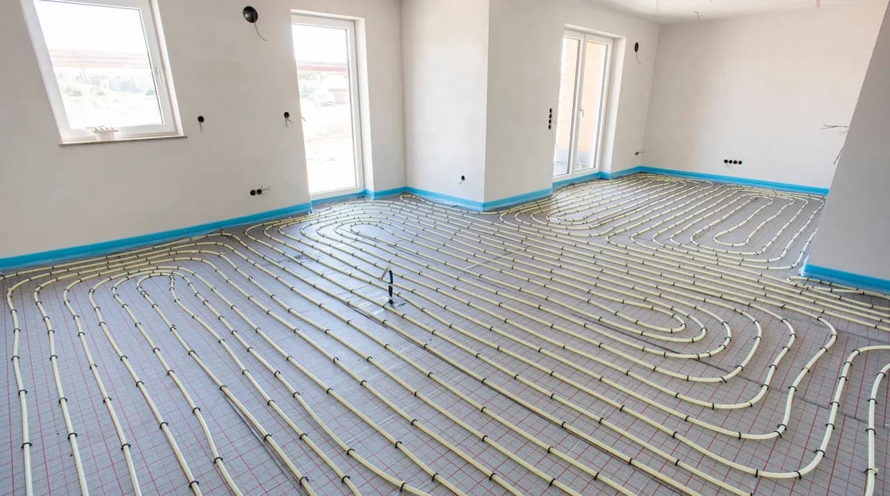 Ogrzewanie podłogowe w bloku: zalety, wady i koszty instalacji